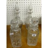 Two pairs of glass decanters (4).