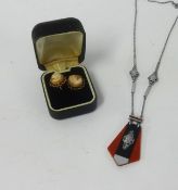 A pair of 9ct gold cameo earrings and an art deco style pendant necklace.