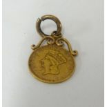 A small United States gold cent as a pendant.