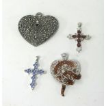 A collection of four fashion jewellery pendants.