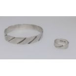 Steven Behrens, a contemporary design silver bangle and band ring (2).