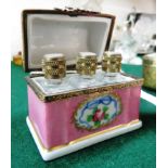 MINIATURE LIMOGES HAND PAINTED PORCELAIN CASKET WITH GILT MOUNTS AND CONTAINING THREE MINIATURE