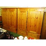 SUBSTANTIAL HONEY PINE TWO DOOR SECTIONAL WARDROBE WITH TWO DRAWERS TO BASE (ONE OF A PAIR)