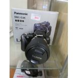 BOXED PANASONIC LUMIX G VARIO DMC-G3K DIGITAL CAMERA AND 14-42MM LENS, INCLUDING BATTERY LEADS AND