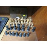 SMALL TIN AND INCOMPLETE SET OF CHESS PIECES