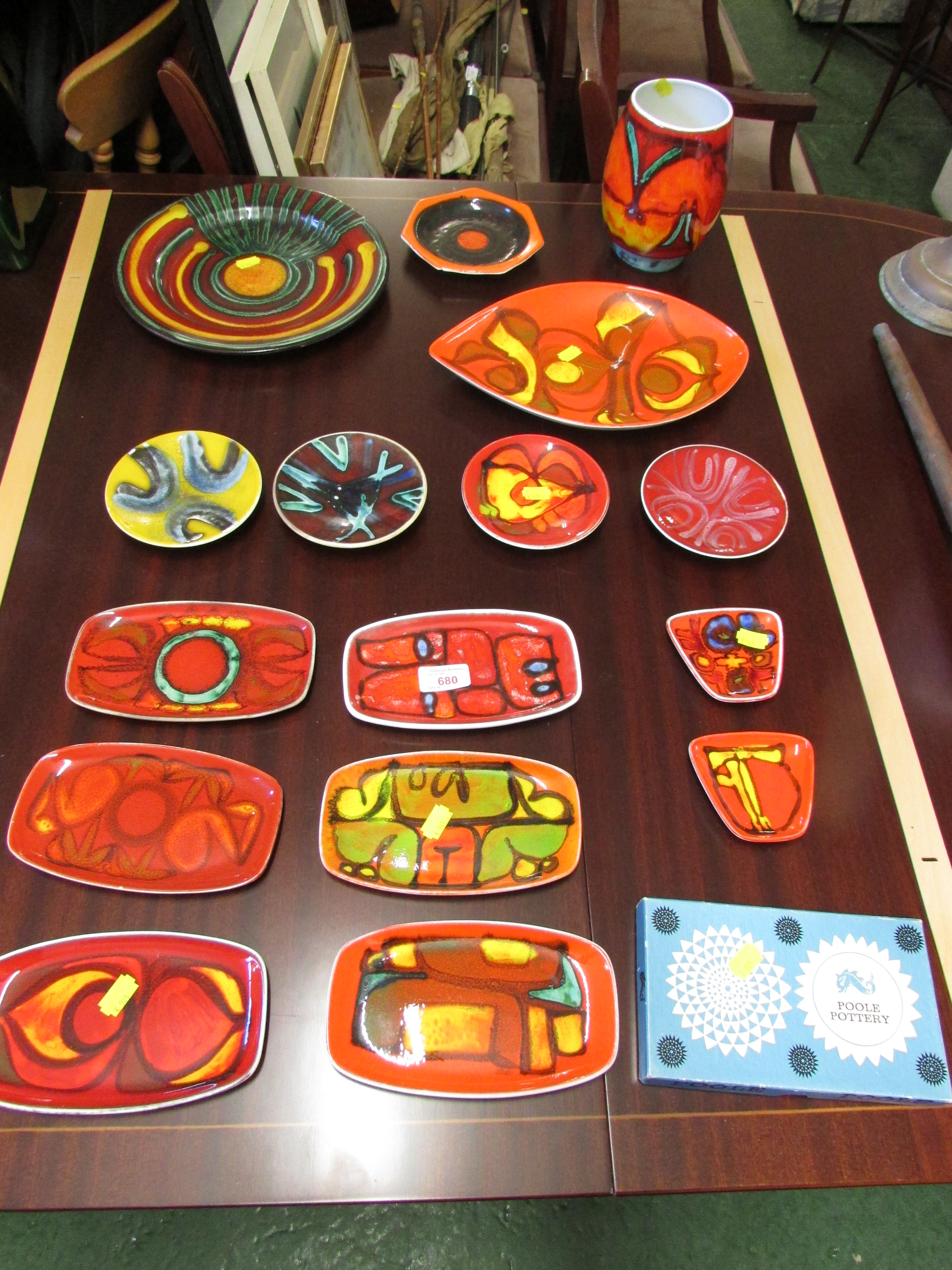 SIXTEEN PIECES OF POOLE POTTERY - DISHES, SMALL TRAYS AND VASE