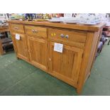 SUBSTANTIAL CONTEMPORARY LIGHT OAK SIDEBOARD WITH THREE DRAWERS OVER THREE CUPBOARD DOORS (ALL