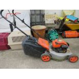 FLYMO LAWNMOWER WITH BRIGGS AND STRATTON PETROL ENGINE