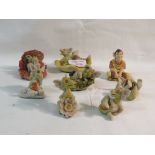 SEVEN MINIATURE ENCHANTICA COMPOSITE BABY DRAGONS AND SEATED FIGURE