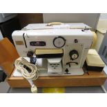 CROWN POINT ELECTRIC SEWING MACHINE IN CASE