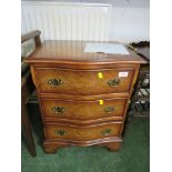 WALNUT VENEERED SERPENTINE BEDSIDE CHEST OF THREE DRAWERS