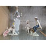 TWO LLADRO FIGURINES - LADY WITH PARASOL AND DOG, AND BOY AND GIRL ON SEESAW (BOTH A/F)