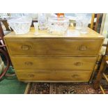 ERCOL MID ELM CHEST OF THREE DRAWERS ON CASTORS