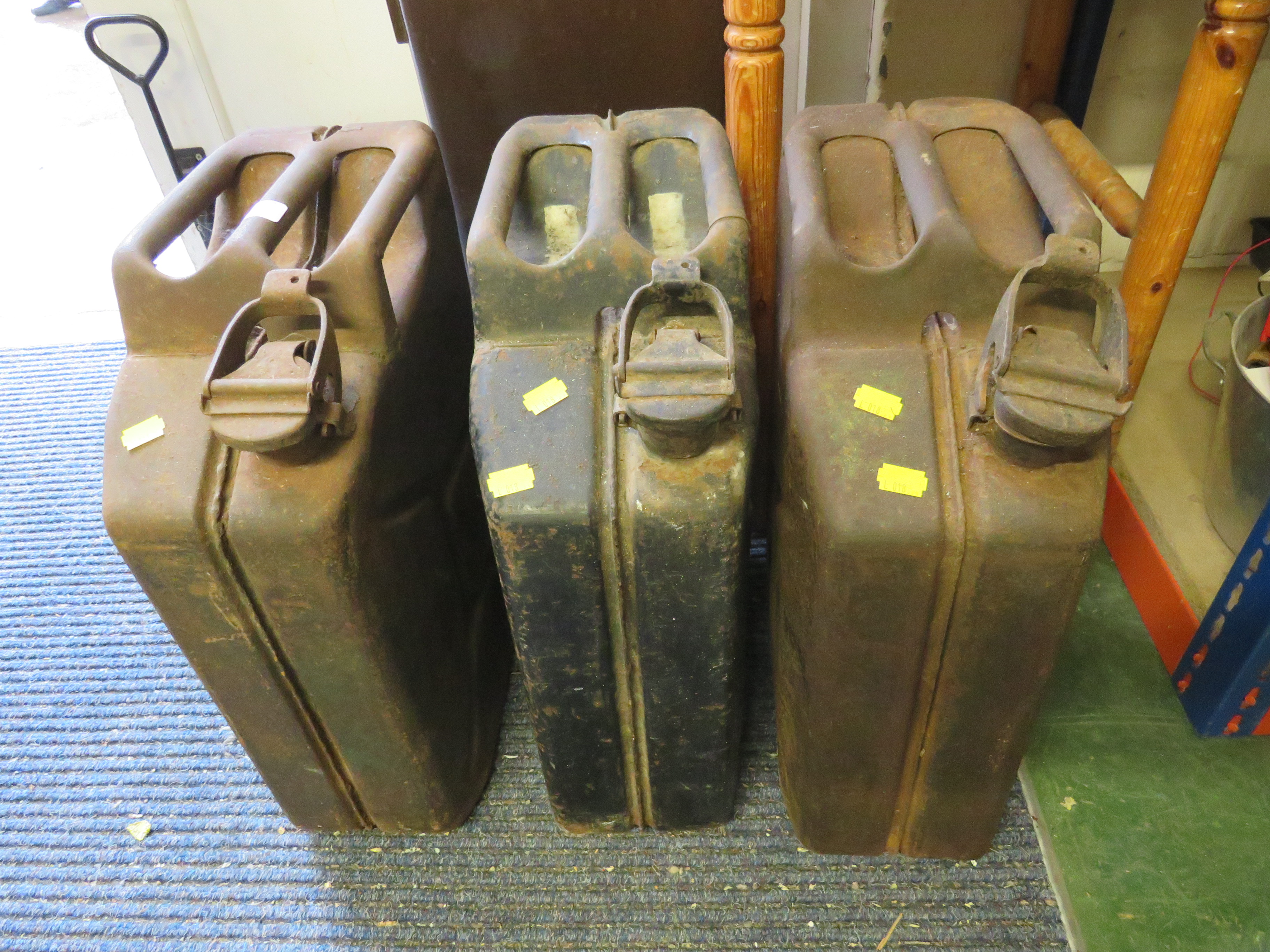 THREE METAL JERRY CANS
