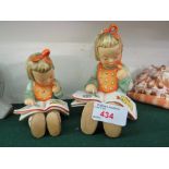 TWO HUMMEL FIGURINES OF SEATED GIRL READING (LARGER AND SMALLER EXAMPLE)