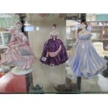 THREE ROYAL WORCESTER FIGURINES - 'LAURA - SUMMER ROMANCE', 'WINTER PALACE' WITH CANCELLATION MARK