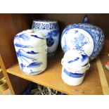 TWO LIDDED POTTERY STORAGE JARS PAINTED IN CHINESE STYLE IN UNDERGLAZE BLUE, CHINESE STYLE CERAMIC