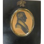 Painted oval portrait miniature of gentleman, head and shoulders enhance silhouette, signed to