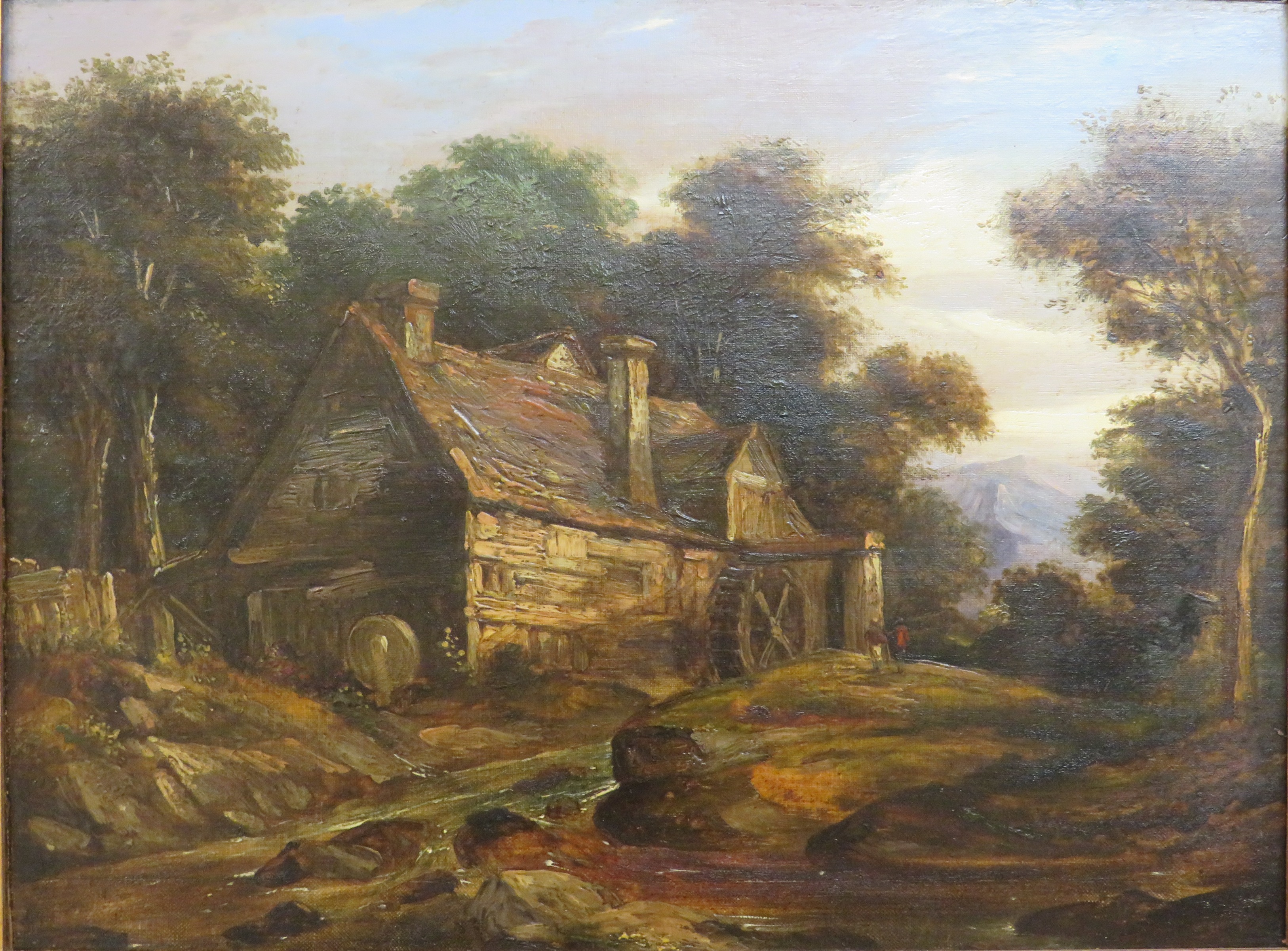 English School (19th century) - a watermill amongst trees, oil on canvas, (29cm x 39cm), in a gilt