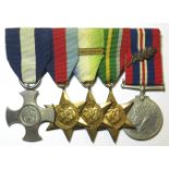 A World War II DSC group of five medals and numerous related papers and photographs. The group