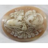 An un-mounted oval cameo depicting two women with bird, moon and stars (29mm x 34mm)