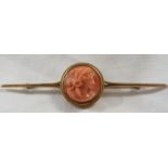 Pinchbeck cameo bar brooch depicting woman's head in profile, the circular cameo in pink striated