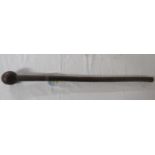 A wooden club or knobkerrie, length 68.5cm [According to the vendor, this was presented to Derrick