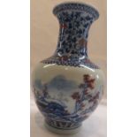 Chinese porcelain bottle vase, painted in underglaze blue and red to the body with landscape with