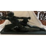 Art Deco style plaster figure of lady drawing bow, overall in a green finish, on a rectangular