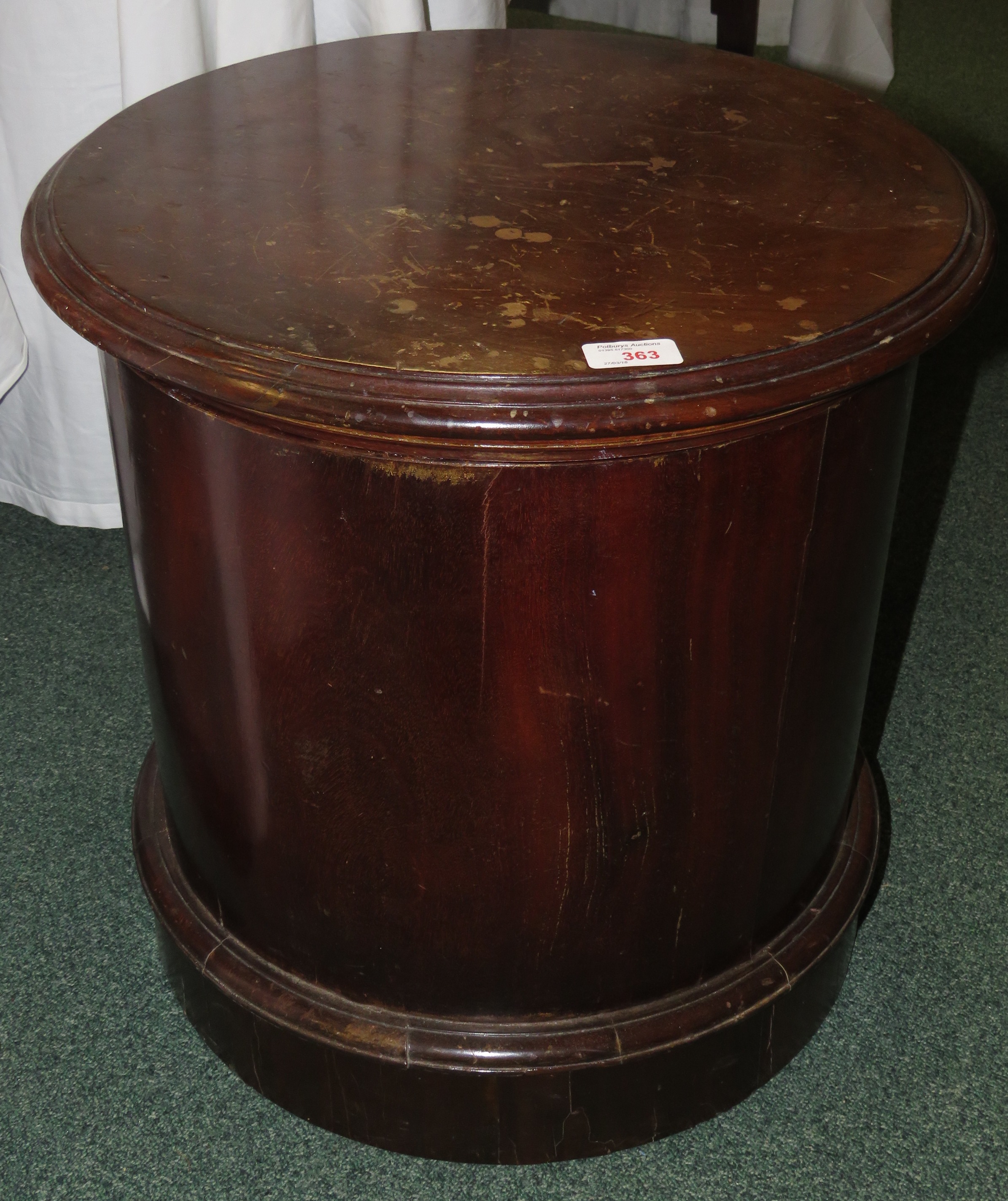 A Victorian mahogany drum-shaped commode stool with hinged lid seat and ceramic bowl, height 48cm,