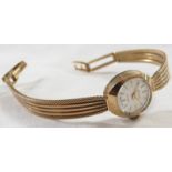 9 carat gold Accurist ladies mechanical wristwatch, baton numerals, dial marked 21 jewels Swiss