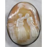 Oval cameo brooch depicting two women by tree (42mm x 31mm) in white metal mount