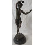 Bronze figure of male athlete or juggler, dressed in loin cloth and standing on one leg with arms