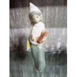 LLadro porcelain figure of girl carrying chicken, height 19.5cm