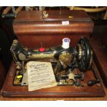 JONES MANUAL SEWING MACHINE IN WOODEN CARRY CASE