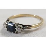 9 carat gold ring set with a square cut sapphire (4mm x 4mm) and two small diamonds, the shank