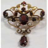 9 carat gold foliate scroll pendant brooch set with seed pearls and red stones, stamped 9 .375,