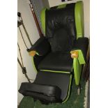 MOBILITY AID - A LARGE MODERN WHEEL ARMCHAIR EXTENSIVELY PADDED IN BLACK AND LIME GREEN COVERS