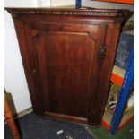 19th century oak corner cupboard, single door with H hinges, dentil cornice, the interior painted