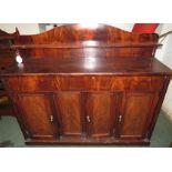 Victorian mahogany sideboard with arched back board and shelf, a long single frieze drawer, the base