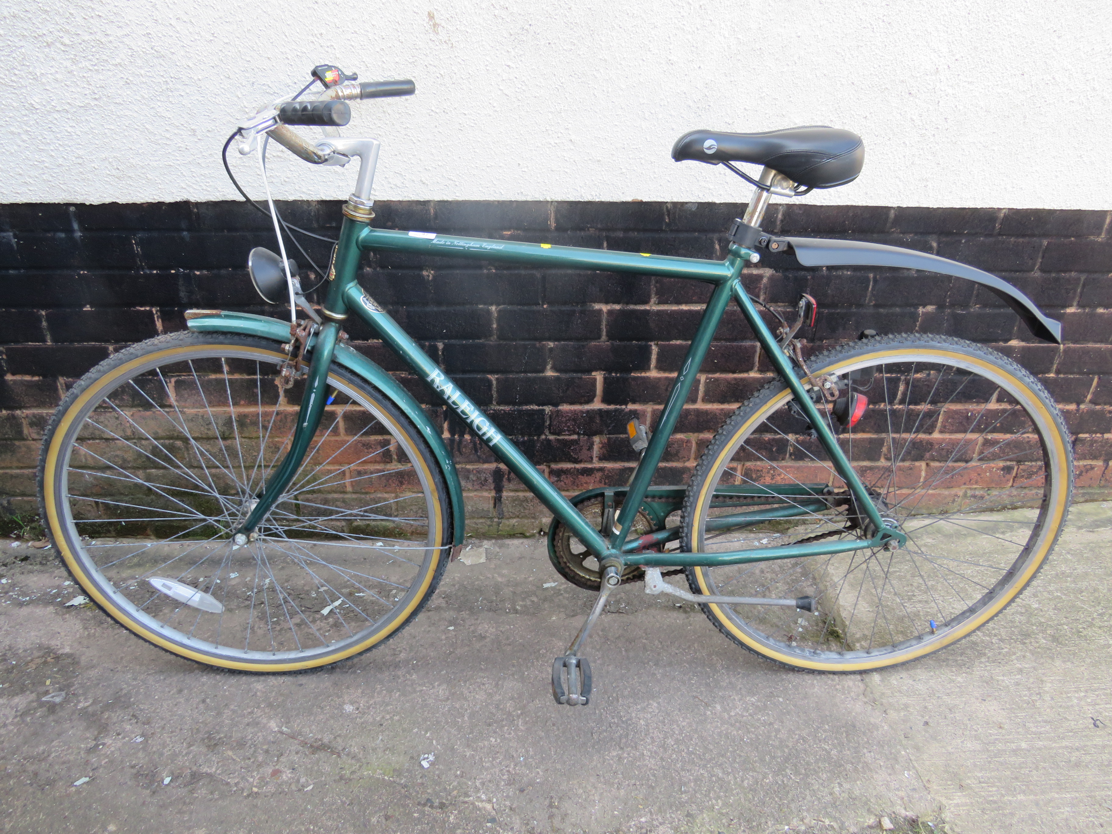 GREEN RALEIGH GENTS BIKE WITH MUD AND CHAIN GUARDS, KICK STAND AND LIGHT