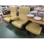 PAIR OF EKORNES STRESSLESS SWIVEL RECLINING ARMCHAIRS AND FOOTSTOOLS IN PALE MUSTARD YELLOW
