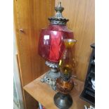 CAST METAL AND RED GLASS TABLE LAMP IN FORM OF OIL LAMP, TOGETHER WITH OIL LAMP