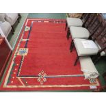 LARGE RECTANGULAR RED GROUND PATTERNED FLOOR RUG