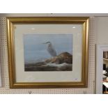 WATERCOLOUR OF HERON ON SHORE SIGNED NEIL COX LOWER RIGHT, GLAZED AND IN GILT EFFECT FRAME