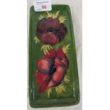 Moorcroft pottery oblong dish, green ground, tube lined decoration of crimson poppies, stamped