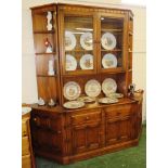 ERCOL MID ELM THREE PIECE LOUNGE UNIT COMPRISING CENTRAL GLAZED CABINET AND TWO CORNER SECTIONS