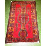 RED GROUND PATTERNED FLOOR RUG