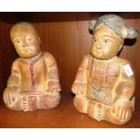 TWO CARVED WOODEN FIGURES - SEATED BOY AND GIRL