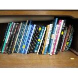 SHELF OF REFERENCE BOOKS INCLUDING RAILWAY RELATED TOGETHER WITH A RAILWAY POSTER